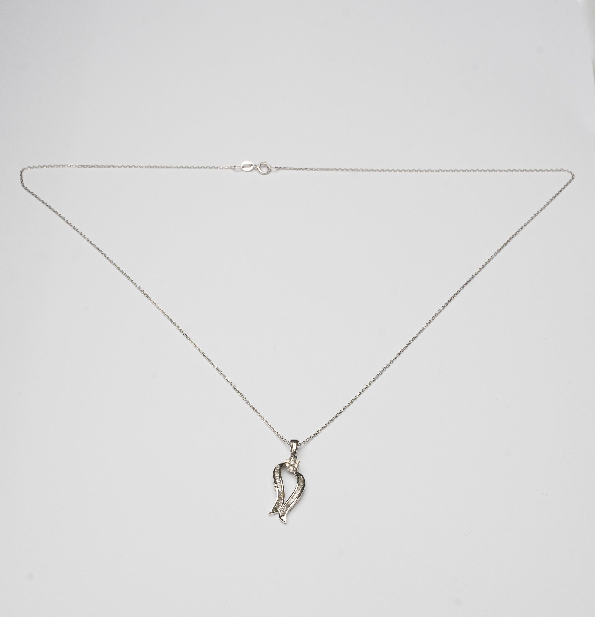 White Gold Necklace set with 0.10 Carats Diamonds and 0.25 Carats Baguette Diamonds. - House Of Lux